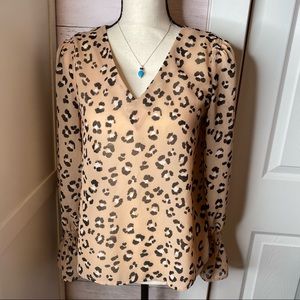 A new day leopard blouse, in good used condition.
